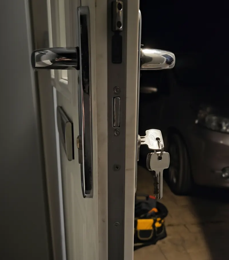 Emergency locksmith attending a door lock at night in Wrexham, Chester & Shrewsbury